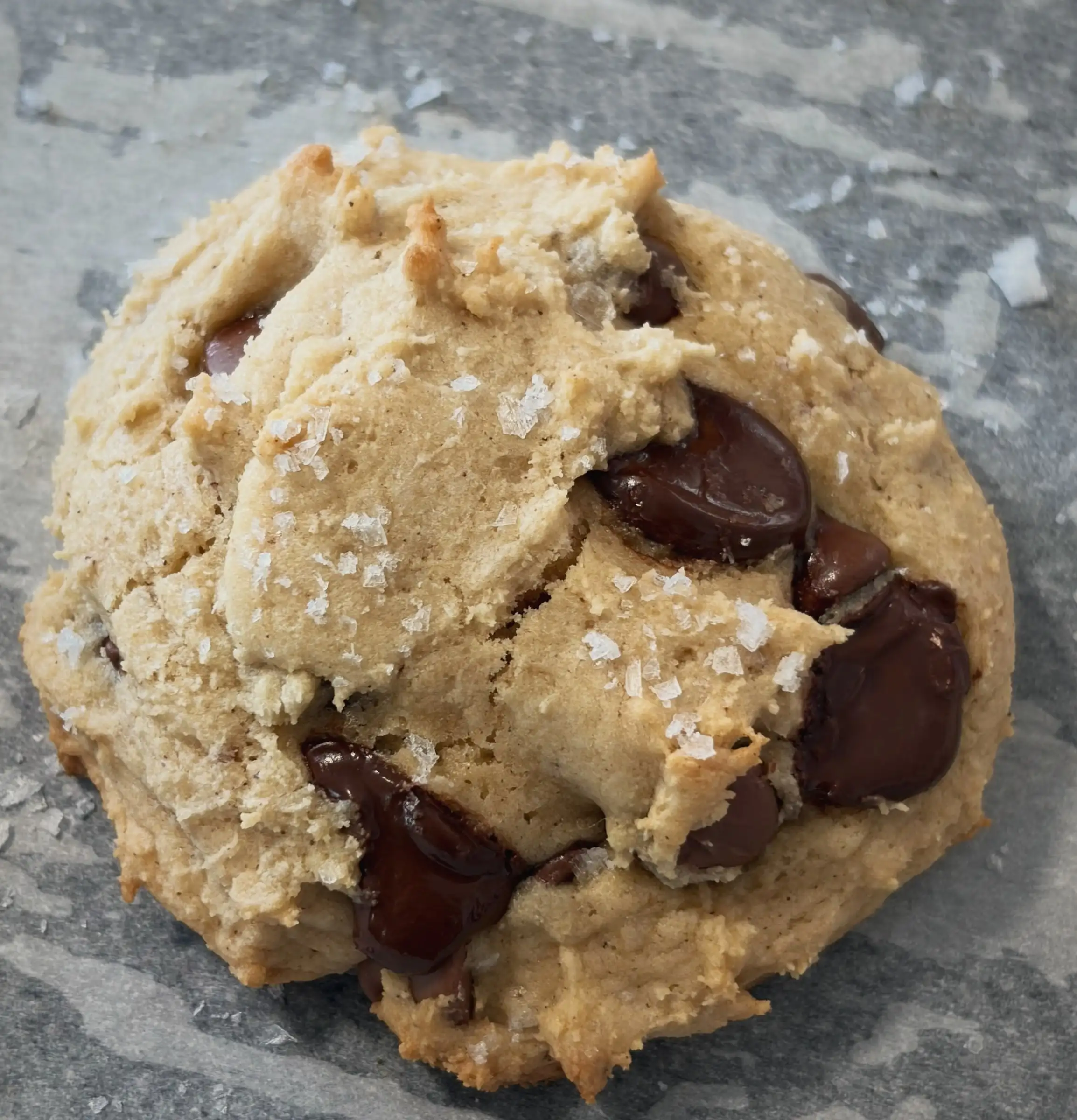 A brown butter chocolate chip cookie with big chocolate chunks